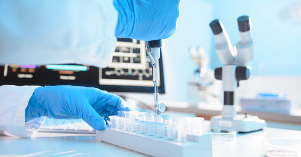 scientist using a pipette
